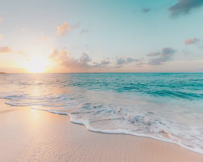 Praia ao pôr do sol, o presente da lua de mel